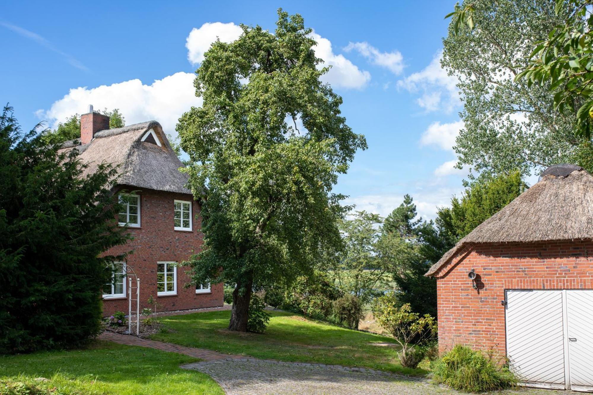Reetdachhaus Eiderblick Villa Breiholz Bagian luar foto